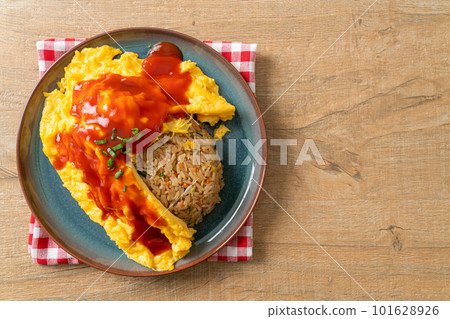 Flavored Fried Rice in an Omelet Wrapping 101628926