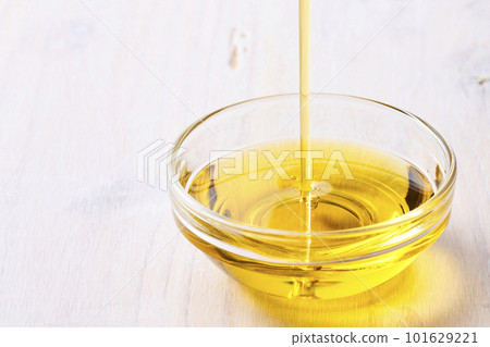 Olive oil poured into a glass dish 101629221