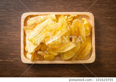 Banana Chips - fried or baked sliced banana 101629705