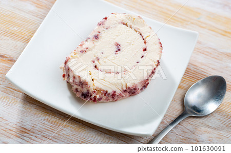 Cheese with cranberries and pasteurized milk on plate Cheese with cranberries and pasteurized milk on plate 101630091
