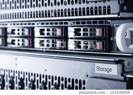 Row of hard drives serving as data storage inside server room Row of hard drives serving as data storage inside server room 101630099