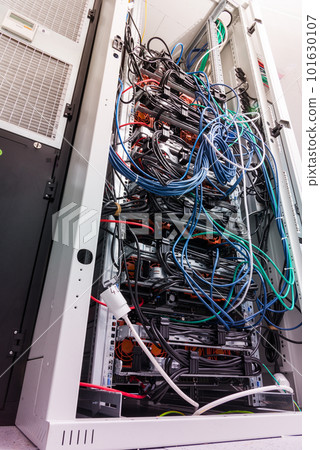 network panel, switch and cables inside internet data center network panel, switch and cables inside internet data center 101630107