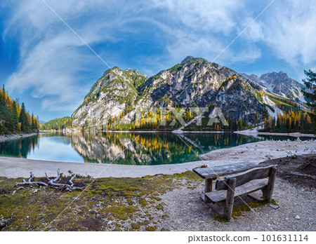 Autumn peaceful alpine lake Braies or Pragser Wildsee. Fanes-Sennes-Prags national park, South Tyrol, Dolomites Alps, Italy, Europe. Picturesque traveling, seasonal and nature beauty concept scene. Autumn peaceful alpine lake Braies or Pragser Wildsee. Fanes-Sennes-Prags national park, South Tyrol, Dolomites Alps, Italy, Europe. Picturesque traveling, seasonal and nature beauty concept scene. 101631114