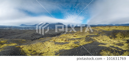 Iceland autumn tundra landscape near Haoldukvisl glacier, Iceland. Glacier tongue slides from the Vatnajokull icecap or Vatna Glacier near subglacial Esjufjoll volcano. Not far from Iceland Ring Road. 101631769