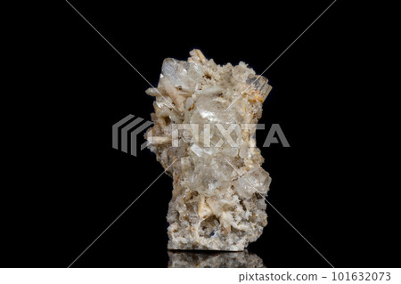 Macro mineral stone fluorite with quartz against black background 101632073