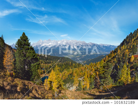 Calm autumn Alps mountain lake with clear transparent water and reflections. Untersee lake, Reiteralm, Steiermark, Austria. 101632189