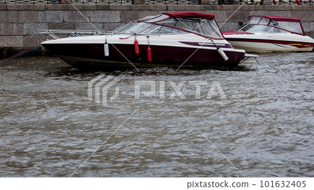 boat is parked in the canal. boat is parked in the canal. 101632405