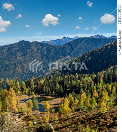 Calm autumn Alps mountain lake with clear transparent water and reflections. Untersee lake, Reiteralm, Steiermark, Austria. 101633092