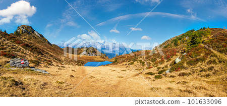 Autumn alpine Kleiner Paarsee or Paarseen lake, Land Salzburg, Austria. Alps Hochkonig rocky mountain group view in far. 101633096