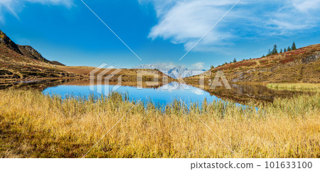 Autumn alpine Kleiner Paarsee or Paarseen lake, Land Salzburg, Austria. Alps Hochkonig rocky mountain group view in far. 101633100
