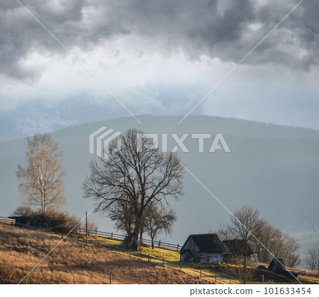 Last good weather days in autumn mountain countryside. Peaceful picturesque Ukrainian Carpathians mountains scene. 101633454