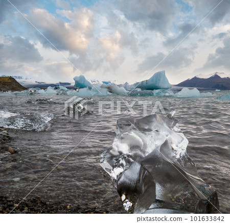 Jokulsarlon glacial lake, lagoon with ice blocks, Iceland. Situated near the edge of the Atlantic Ocean at the head of the Breidamerkurjokull glacier, Vatnajokull icecap or Vatna Glacier. 101633842