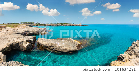 Picturesque seascape with white rocky cliffs, caves, sea bay and islets at Grotta della poesia, Roca Vecchia, Salento Adriatic sea coast, Puglia, Italy 101634281