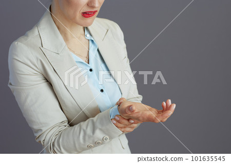 Closeup on female employee in light business suit 101635545