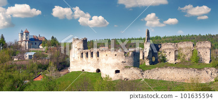 Spring view of Sydoriv Castle ruins (built in 1640s) and Katolitsky church (built in 1730-1741). Sydoriv village, located 7 km south of Husiatyn, Ternopil region, Ukraine. Spring view of Sydoriv Castle ruins (built in 1640s) and Katolitsky church (built in 1730-1741). Sydoriv village, located 7 km south of Husiatyn, Ternopil region, Ukraine. 101635594