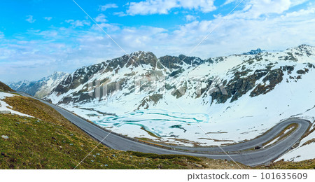 Road in summer Alps mountain and frozen lake (Austria). Panorama. Road in summer Alps mountain and frozen lake (Austria). Panorama. 101635609