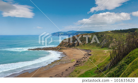 Beach Azkorri (or Gorrondatxe) in Getxo town, Biscay bay (Spain). Summer Atlantic coast landscape. 101635620