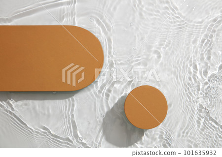 Two podiums with different geometric shapes in brown color. flat lay background trendy stylish minimalist flat lay backdrop. Two podiums with different geometric shapes in brown color. flat lay background trendy stylish minimalist flat lay backdrop. 101635932