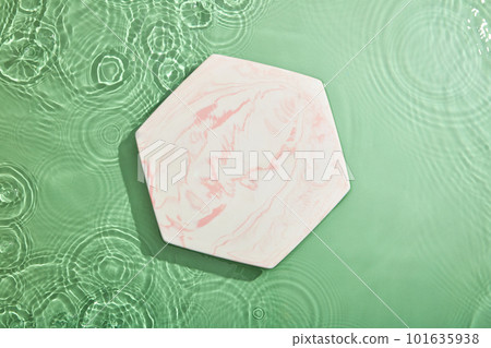Marble hexagon podium in the center of the picture. Blank space for cosmetic product presentation . Top view Marble hexagon podium in the center of the picture. Blank space for cosmetic product presentation . Top view 101635938