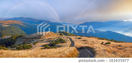 Autumn Carpathian Mountains (Ukraine) panorama landscape with country road. Autumn Carpathian Mountains (Ukraine) panorama landscape with country road. 101635977