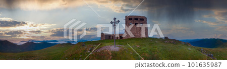 Summer sunrise observatory ruins panorama view on Pip Ivan mountain top with christianity cross near (Chornogora Ridge, Carpathian, Ukraine). Summer sunrise observatory ruins panorama view on Pip Ivan mountain top with christianity cross near (Chornogora Ridge, Carpathian, Ukraine). 101635987