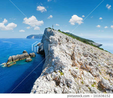 Rocky south cape of Lefkas island and lighthouse (Greece, Ionian Sea) 101636152