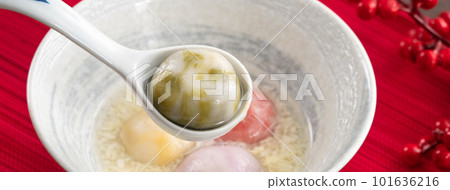Colored glaze style big tangyuan with sweet rice wine soup and egg drop. 101636216