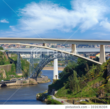 Ponte do Infante, Maria Pia Bridge and St John's Bridge over Douro river in Porto, Portugal. People are unrecognizable. Ponte do Infante, Maria Pia Bridge and St John's Bridge over Douro river in Porto, Portugal. People are unrecognizable. 101636304