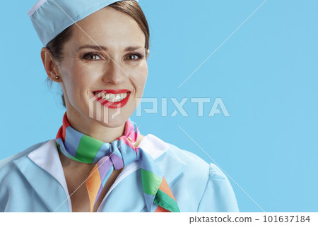 happy stylish air hostess woman on blue 101637184