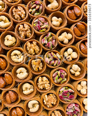 Oriental sweets close up. Baklava with pistachios Oriental sweets close up. Baklava with pistachios 101639073