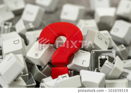 Red plastic question mark in the pile of computer keyboard keys Red plastic question mark in the pile of computer keyboard keys 101639319