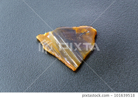 Agate Crystal cross section. Natural light translucent stone close up Agate Crystal cross section. Natural light translucent stone close up 101639518