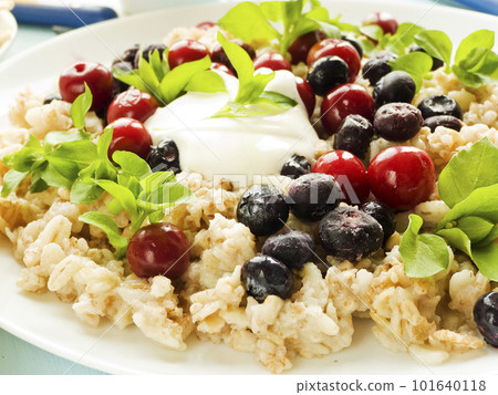 Morning porridge with berries Morning porridge with berries 101640118