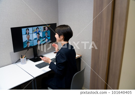 A woman having an online meeting in a private room 101640405