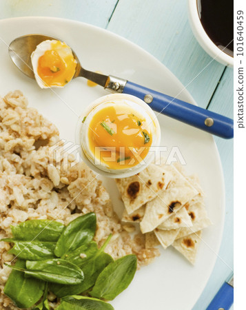 Breakfast porridge and egg 101640459