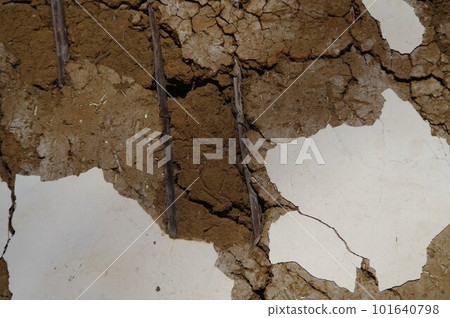 Old and dilapidated traditional Japanese earthen wall color 4 101640798