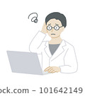 A man in a white coat who is worried about operating a personal computer 101642149