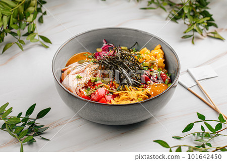 Portion of sous vide chicken poke bowl 101642450