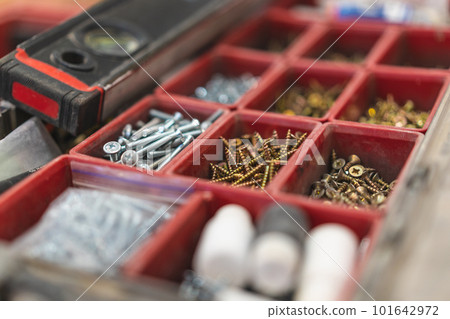 many different screws in the organizer of master for work many different screws in the organizer of master for work 101642972