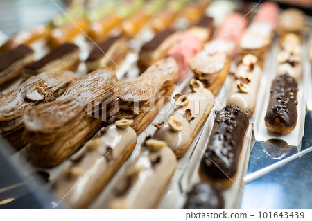 various delicious sweet pastries in the shop window. various delicious sweet pastries in the shop window. 101643439