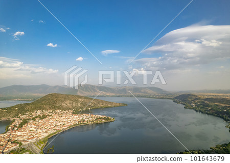Landscape of countryside town, village and lake of Orestiada in Kastoria during summer sunny day over a mountain peak in Greece. Aerial, drone, top view. Panorama 101643679