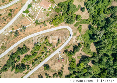 Meandering serpentine road in the mountain. Aerial view. Copter, drone view 101643747