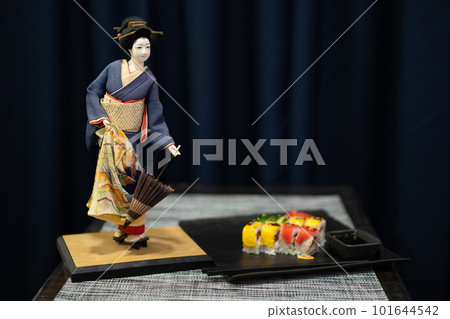 a beautiful figure of a geisha 101644542