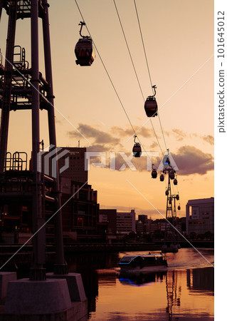 YOKOHAMA AIR CABIN (ropeway) and sea bus (water bus) at dusk 101645012