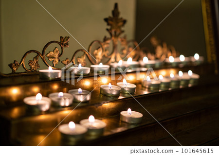 many candles in the church 101645615