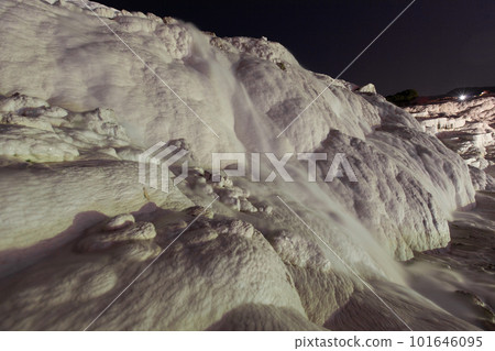 Pamukkale on the top with a view of the city of Denizli at night, Turkey. 101646095