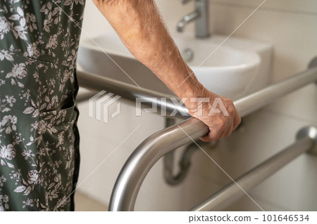 Asian senior or elderly old lady woman patient use toilet bathroom handle security in nursing hospital, healthy strong medical concept. 101646534