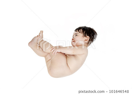 Side view of a naked baby on a white background, full body 101646548