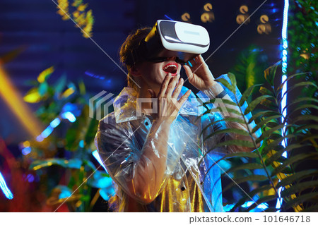 surprised trendy woman in virtual reality in vr headset surprised trendy woman in virtual reality in vr headset 101646718