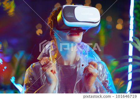 trendy 40 years old woman in virtual reality in vr goggles trendy 40 years old woman in virtual reality in vr goggles 101646719